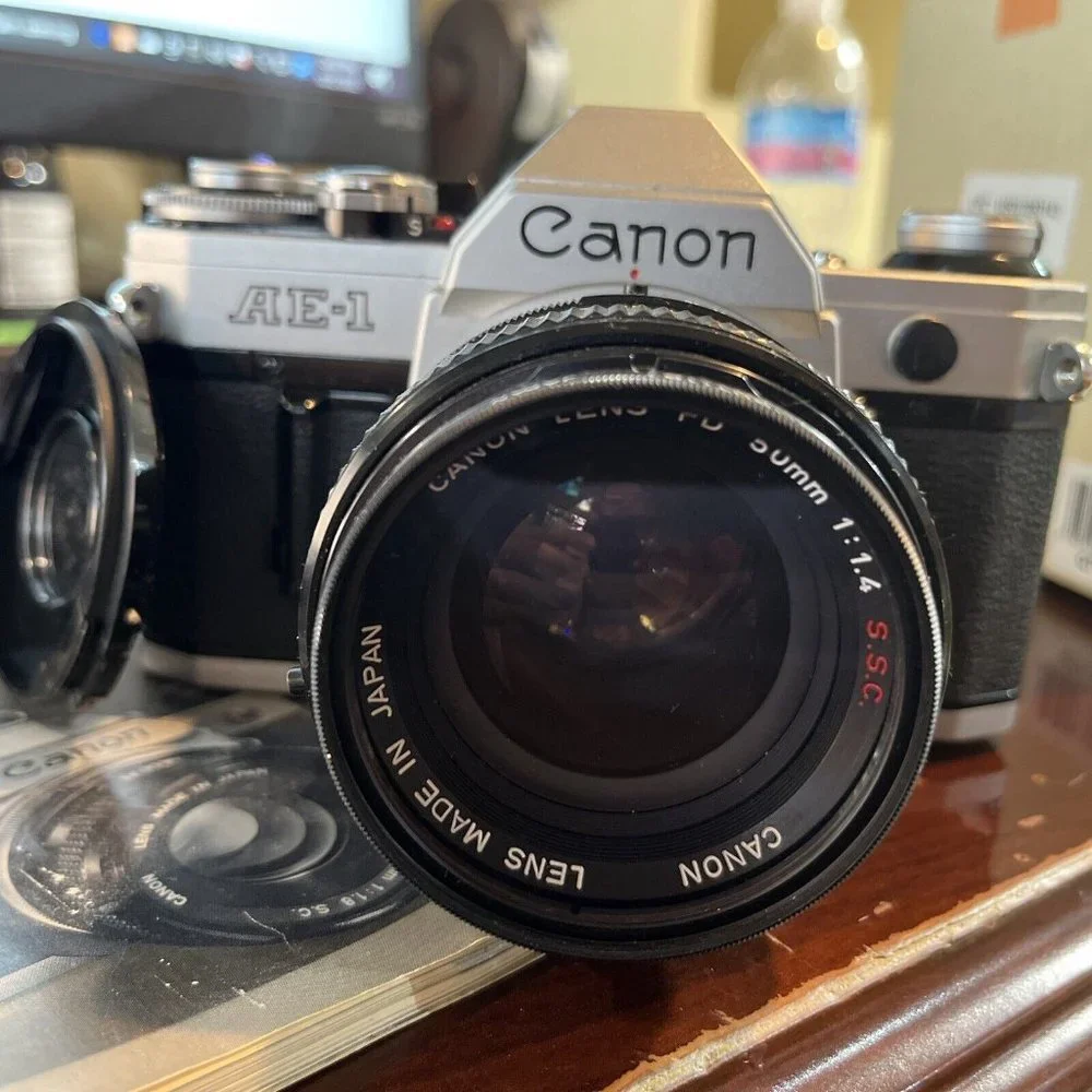 Canon AE-1 Program 35mm SLR Film Camera with 50 mm lens Kit + Instructions! Nice